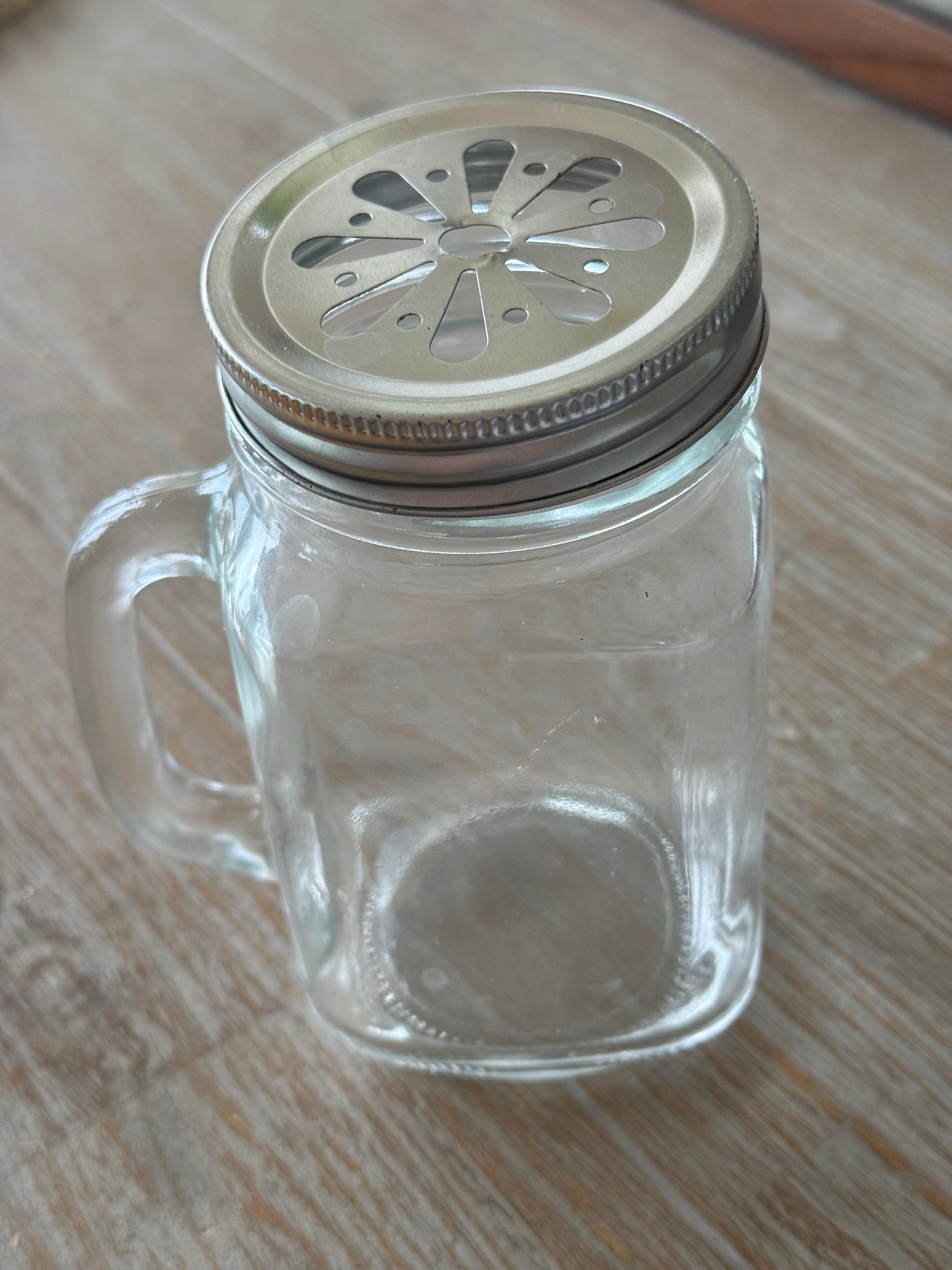 Gjenbrukskatt glass med håndtak og lokk